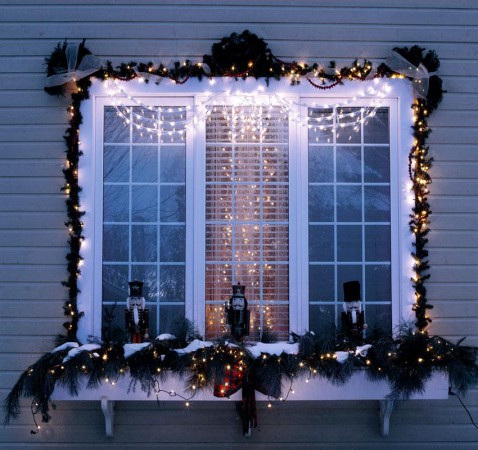 How beautiful to decorate a window with a garland for the New Year