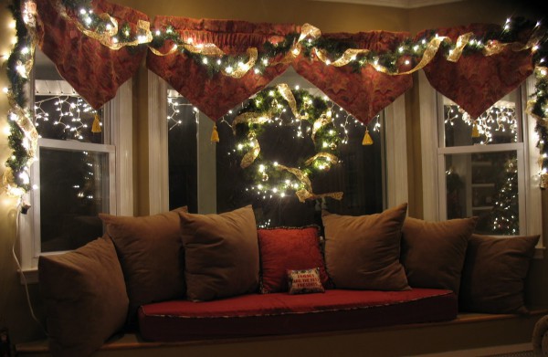 Christmas garlands to decorate the window for the New Year