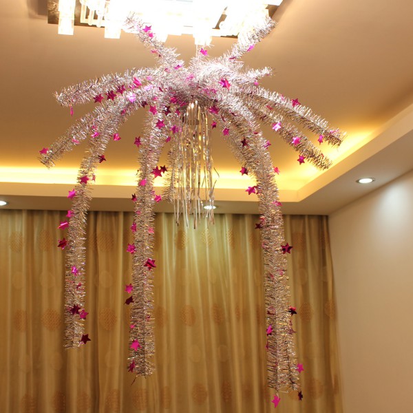 Ceiling decoration with tinsel for the New Year
